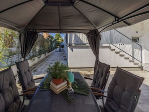 Furniture, Plant, Shade, Chair, Building, Outdoor Furniture, Water, Leisure, Houseplant, Real Estate