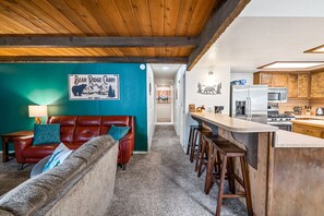 Dining Room. - Dining Table - 8 adults or up to 10 w/kids (bench seating on side), and additional 4 bar stool seating