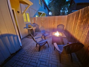 Walk out to a private fenced yard, outdoor seating, a propane grill, and a gas fire table. Great for Northern Arizona nights!