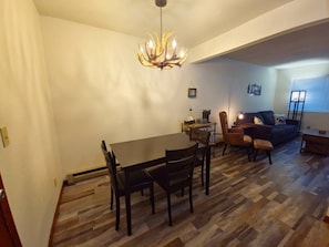 With tasteful overhead lighting and a table that seats six, meals or game nights are easy.