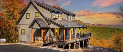 Surrounded by nature, this cozy log cabin offers a peaceful retreat with stunning mountain views.