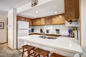 Unleash your inner chef or simply brew a cozy cup of coffee at our full kitchen!