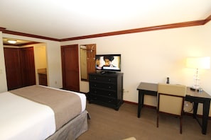 bedroom with television & desk