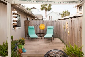 The SAND BAR's Sun Deck with loungers