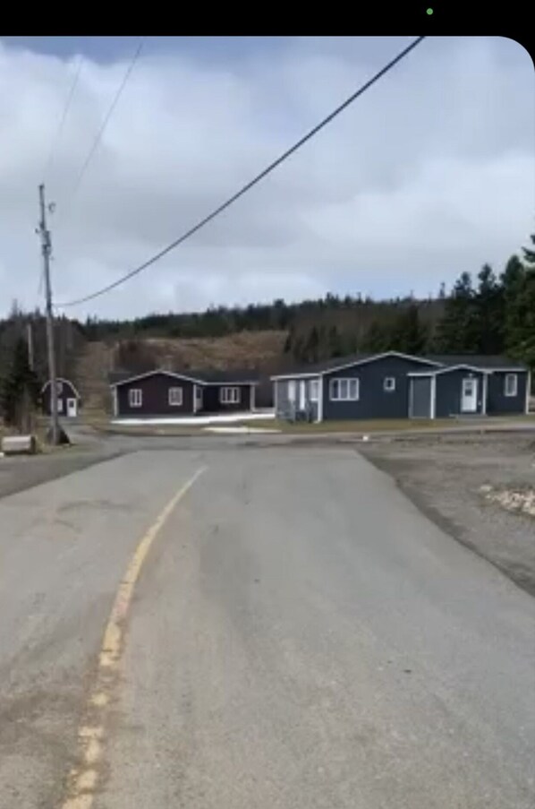 Front of House - fully paved road and the house is in a community.