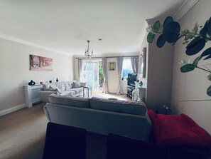 Living room feeding out to rear garden