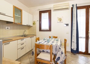Table in the living room-Eden-Elba Island