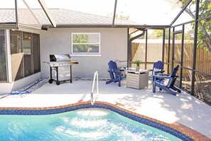 Poolside...grill, fire table and chairs (no longer has pool enclosure)