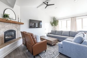 Living Room with Sofa Sleeper, fireplace, 75" Smart TV