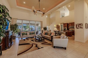 Heart of The Home - - Enjoy the perfect blend of modern design and cozy elegance in this stunning living room
- Plush seating and striking ceiling fans make the space both functional and chic
- It’s the heart of the home, designed for unforgettable moments and gatherings