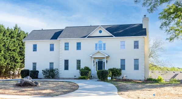 Colonial style house is a stand out in the community.