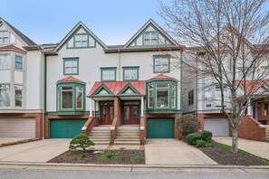 Washington's Landing Townhome with one car garage + driveway parking.