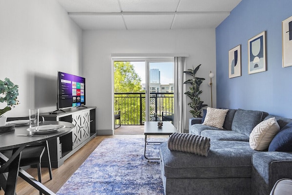 Beautiful 3 bedroom, 2 bathroom apartment complete with a full kitchen, Living Area, AC, desk, TV, washer/dryer, balcony, & much more!
