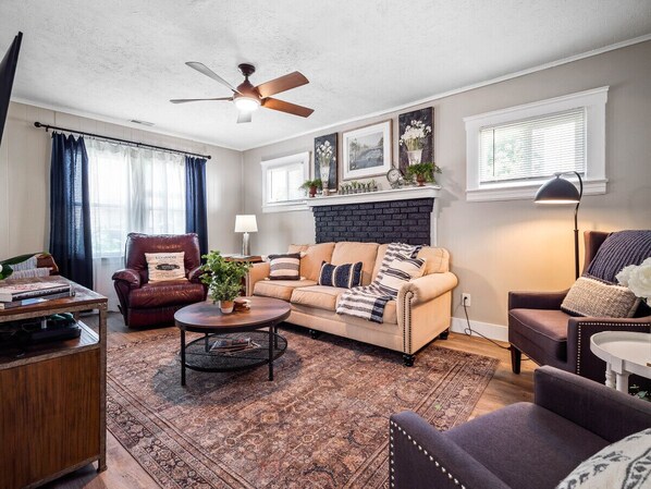 Cozy vibes and a gentle breeze, this living room is the perfect spot to kick back and relax! ✌️ #ChillZone