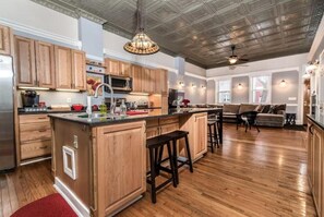 Kitchen within the open floor plan allows our guests to be together