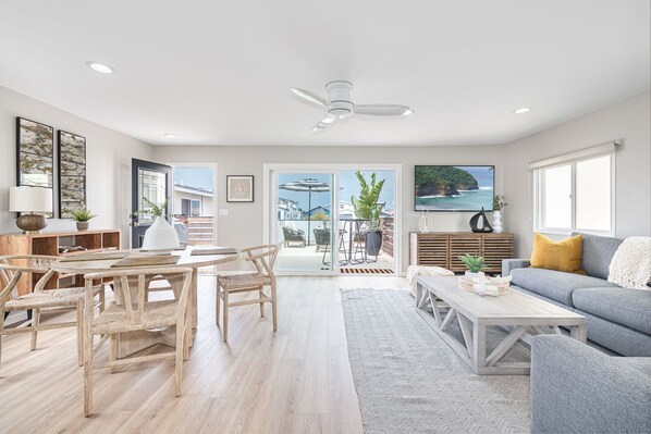 Centrally located, steps from the shore, this newly remodeled upstairs unit is perfectly situated. Walk to dining, attractions, and parks. It's one of three units on the property.
                