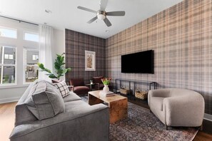Spacious Living Room with Elegant Décor and Natural Light