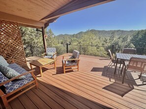 Outdoor deck with lounge seating and dining