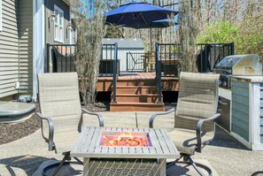 Fire table gathering area on back patio