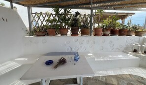 Private terrace with sea view – perfect for coffee or dinner
