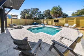Private Backyard with Heated Pool, Lounge Seating, Outdoor TV, and Ping Pong Table