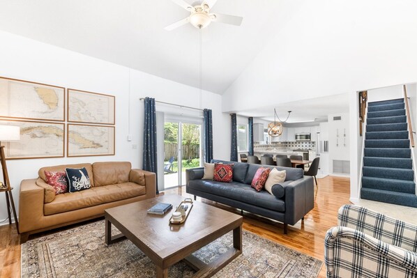 Spacious and bright, offering high ceilings and seating ideal for relaxation.