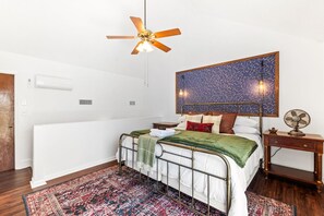 King loft bedroom inspired by celestial navigation.
