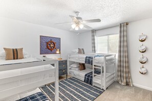 Set sail for sweet dreams in these charming bunk beds.