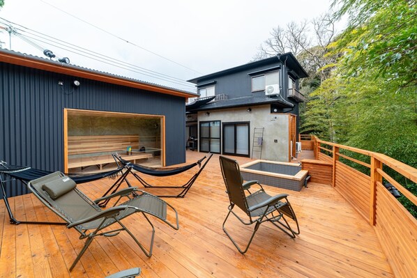 A spacious wooden deck. All of it is exclusively for our guests.