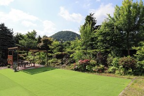 A garden surrounded by greenery