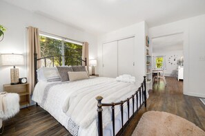 Primary Bedroom (Shared Space - The main entrance to the house goes through this room)