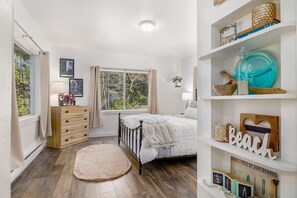 Primary Bedroom (Shared Space - The main entrance to the house goes through this room)