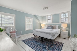 Comfortable queen bed in bedroom #1 with a spacious closet.