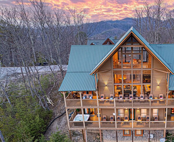 Nestled in nature, this rustic cabin offers a peaceful, secluded escape as dusk settles in. 🌅🏕️ Embrace the charm of the wilderness, unwind, and let nature’s beauty surround you."