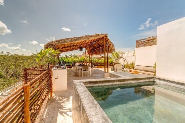 Your own private rooftop pool and lounge!