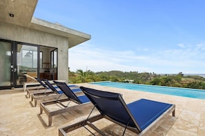 The highlight of Casa Rosa is undoubtedly its private infinity pool, where you can cool off and unwind while taking in the breathtaking ocean views.