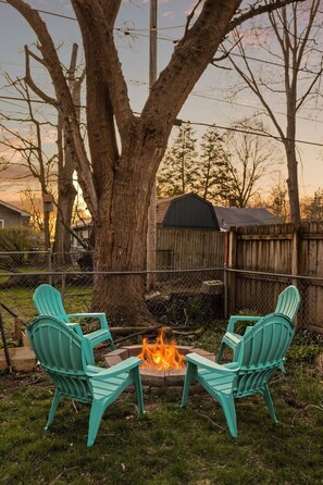 Step into our outdoor oasis and unwind in our private backyard, complete with a firepit, and ample outdoor seating. It's the perfect setting for BBQ nights and toasting marshmallows under the stars.
