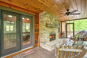 Screened-in porch with fireplace