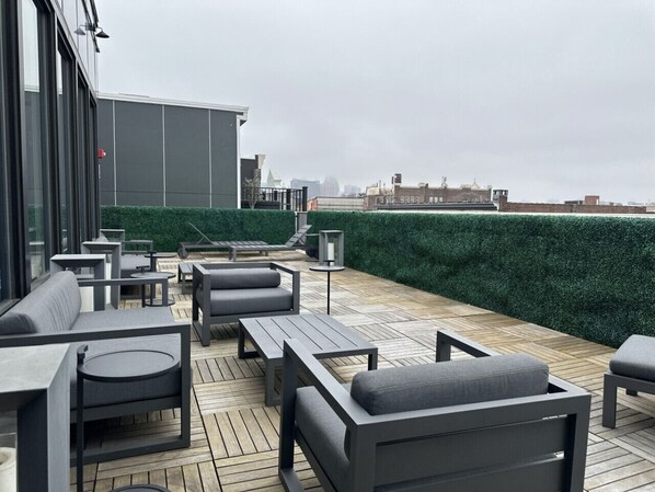 Gorgeous view from the rooftop of the building complete with lounge seating area. This space is shared with the rest of the building, guests are welcome to use it!