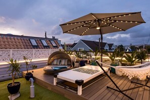 Have a relaxing night on the rooftop deck.
