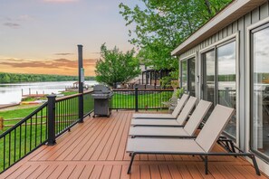 A deck that overlooks the lake.