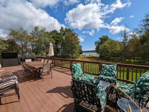 Enjoy alfresco meals and serene views on our front porch oasis.