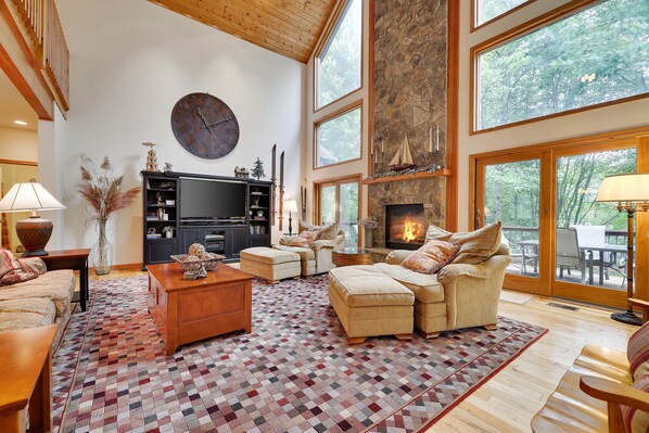 Bask in the airy embrace of our spacious living room, where natural light dances freely.