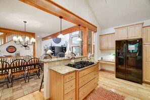 Cooking hub with sleek stove-top sophistication.