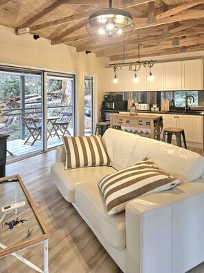 A cosy living space flowing into your kitchenette