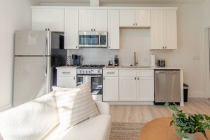 Fully stocked kitchen. You can cook in or feel free to eat out.