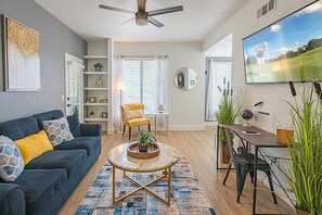 Cozy up in our stylish living room – the perfect spot to unwind and relax.
