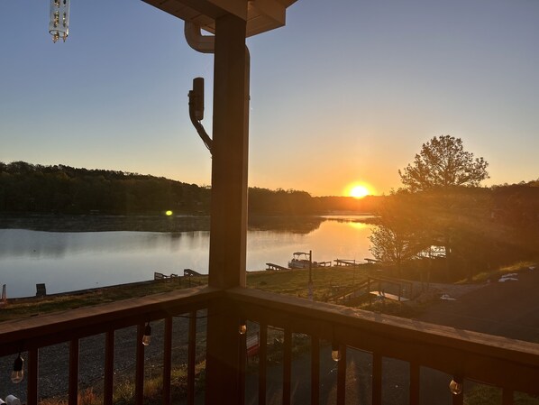 View the sunrise from the covered balcony,  master bedroom, living room or patio