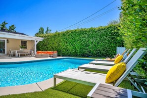 Solar heated pool w loungers
