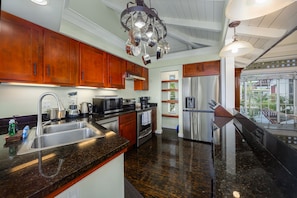 The kitchen is set to prepare a tropical meal amid an island-inspired ambiance.